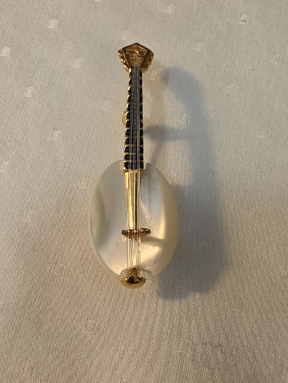 Gold and Frosted Glass Musical Instrument Brooch